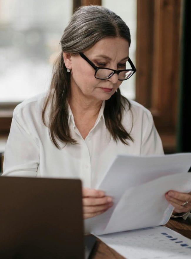 Older Woman Doing Paperwork