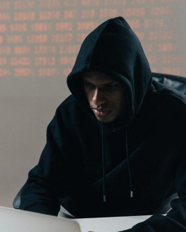 Hooded Scammer