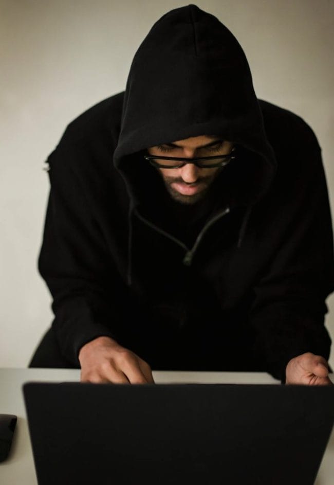 Hooded Scammer