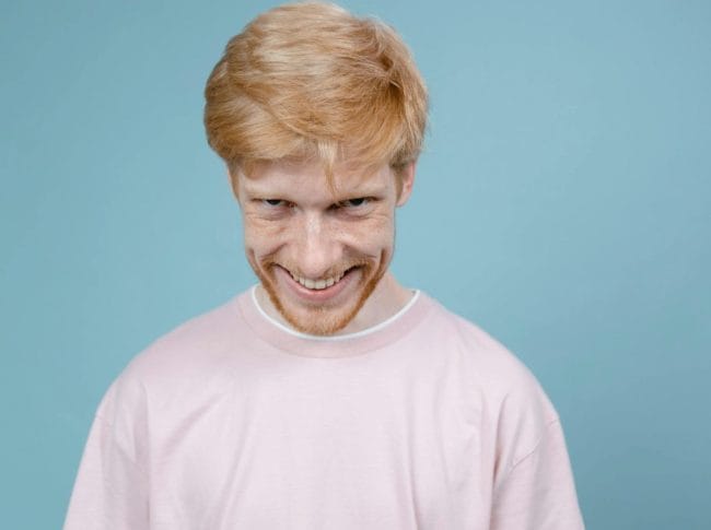 Sly Grin Man