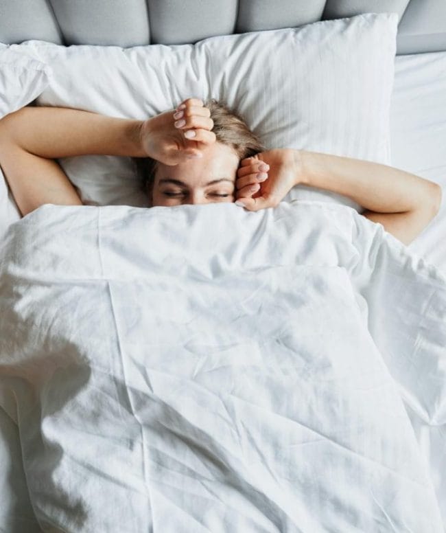 Woman In Bed