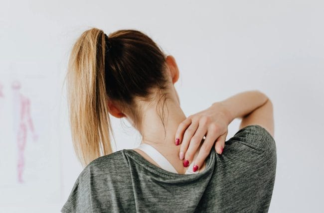 Woman Rubbing Neck
